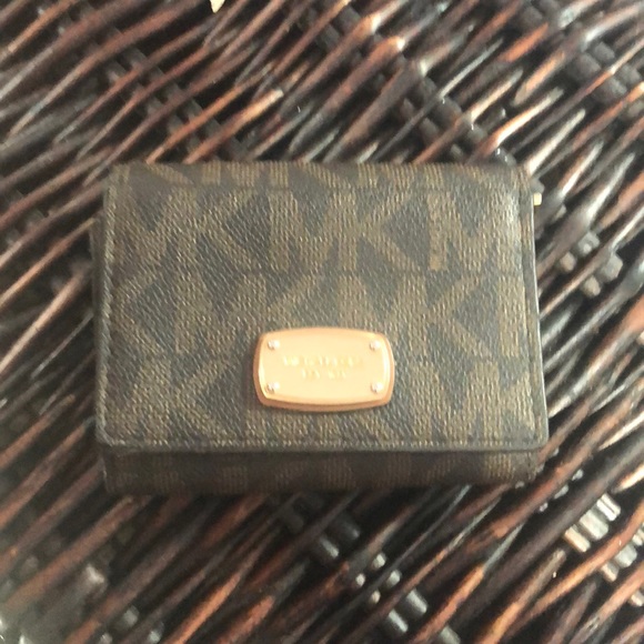 Michael Kors Handbags - Authentic Micheal Kors Bi fold wallet